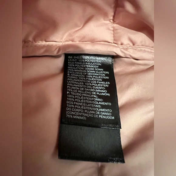 The north face 
Pink puffer vest 
Pilling on inside, Small stains on front - Picture 5 of 9